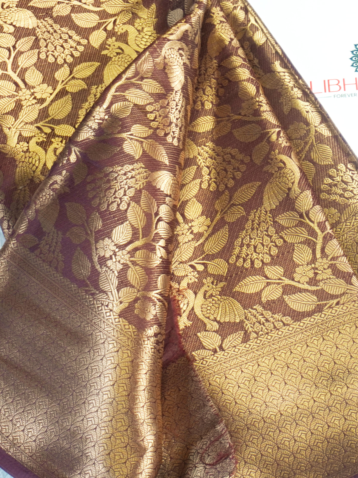 Deep Maroon Kanjeevaram Soft Silk Blend Saree with Antique Gold Peacock & Floral Jaal Work