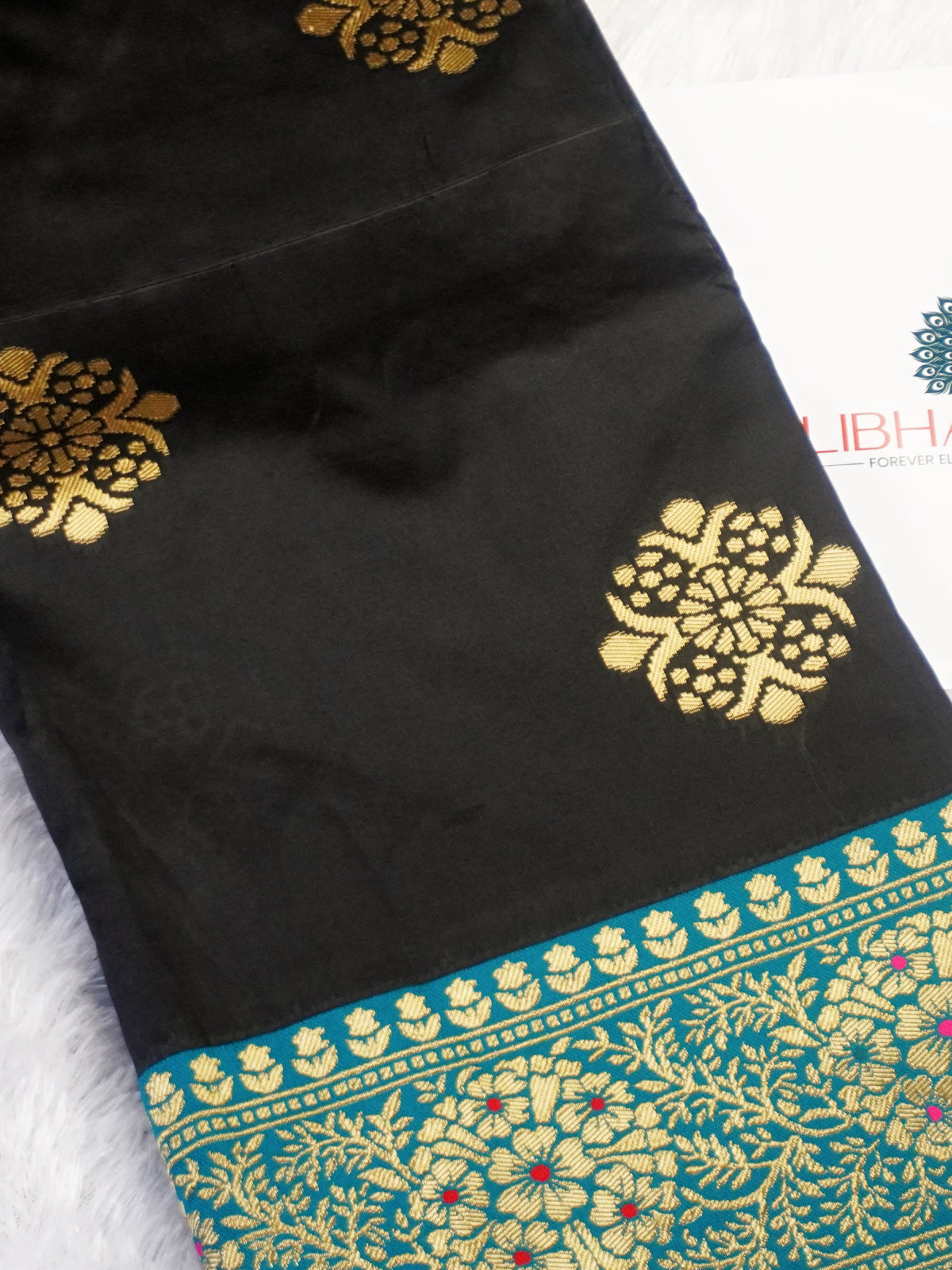 Midnight Black Silk Blend Saree with Teal Blue Zari Border & Floral Motifs