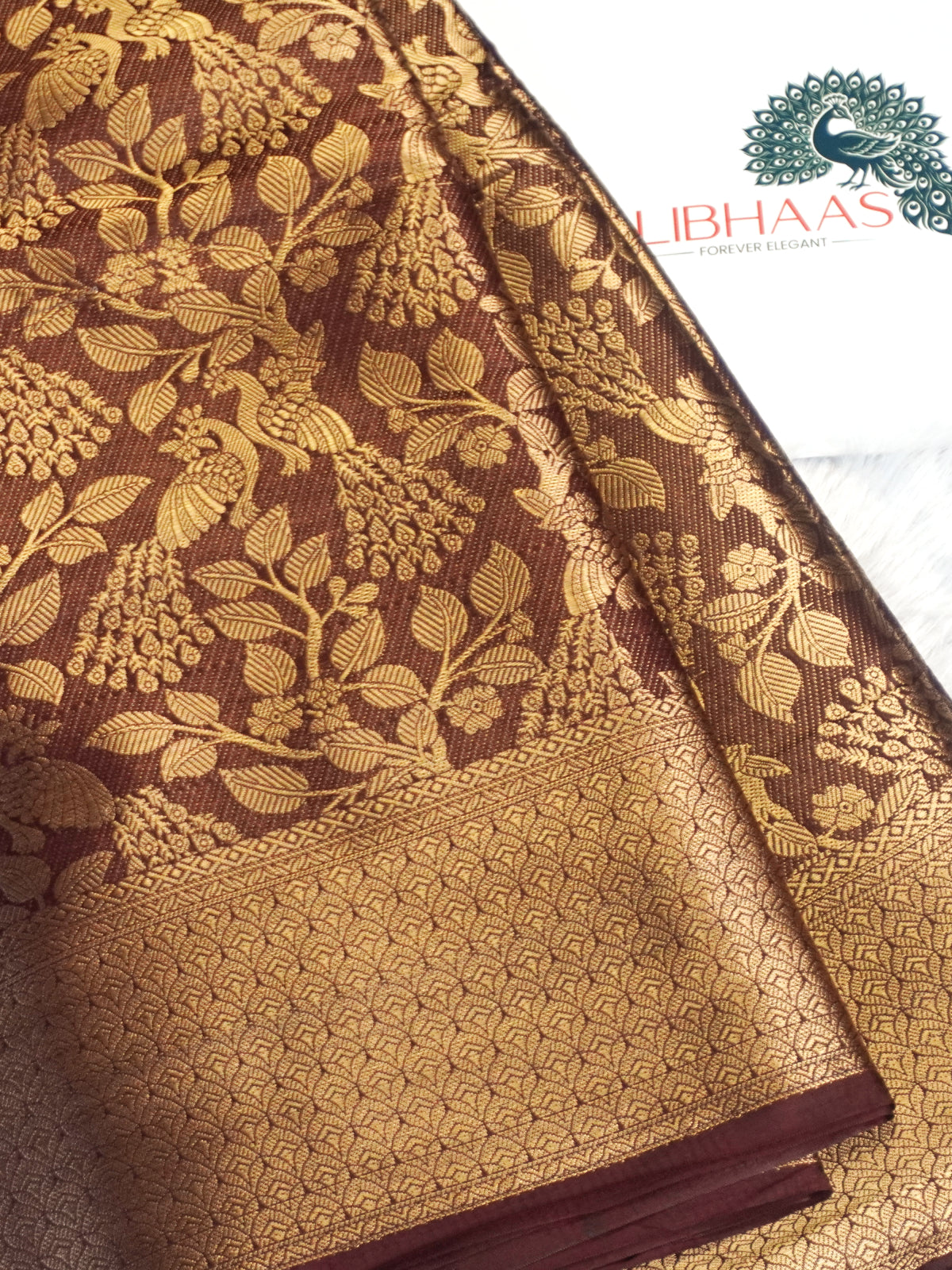 Deep Maroon Kanjeevaram Soft Silk Blend Saree with Antique Gold Peacock & Floral Jaal Work