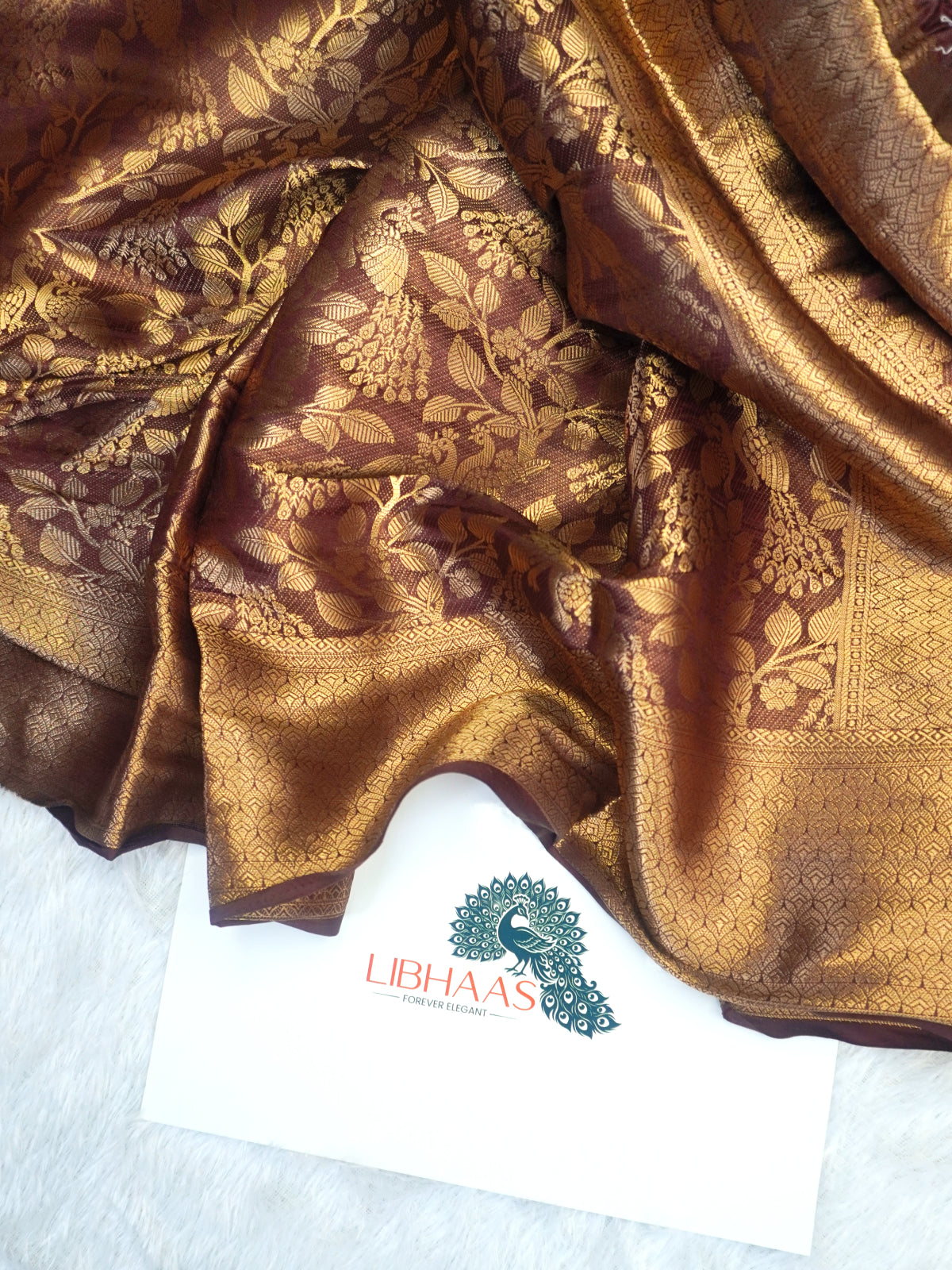 Deep Maroon Kanjeevaram Soft Silk Blend Saree with Antique Gold Peacock & Floral Jaal Work